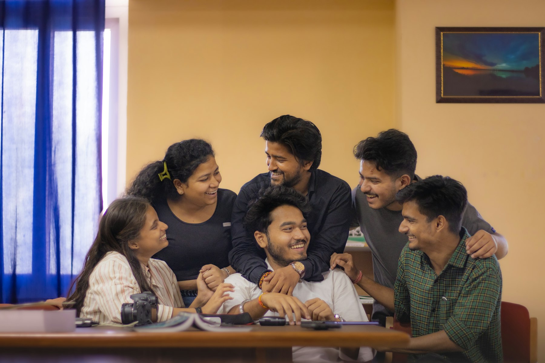 Students working together around a table