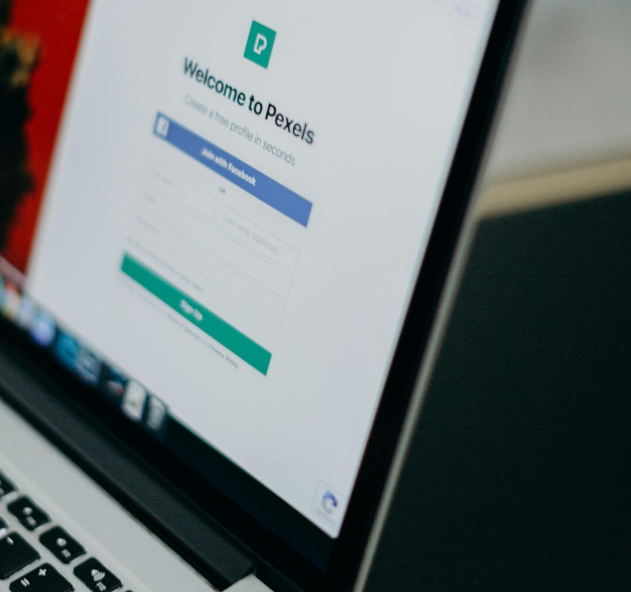 Focused shot of a laptop displaying the Pexels login page, highlighting modern digital interface.